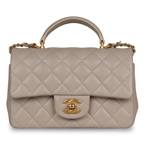 chanel mini bags|Chanel mini flap bag with top handle.